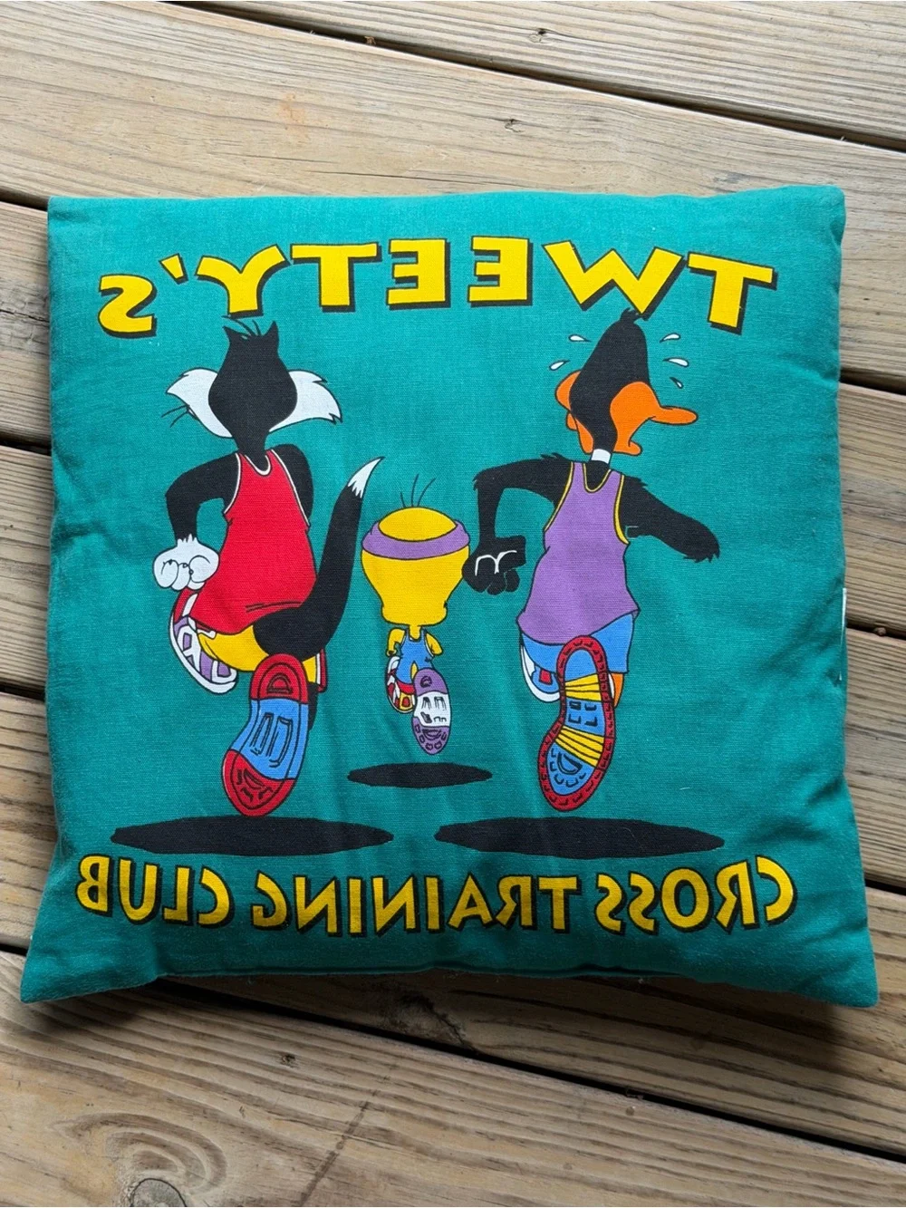 vintage 1994 Looney Tunes Tweety's Cross Training throw pillow by Warner Bros